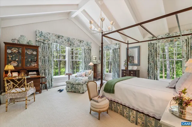 a view of a sink sitting in a kitchen next to a window