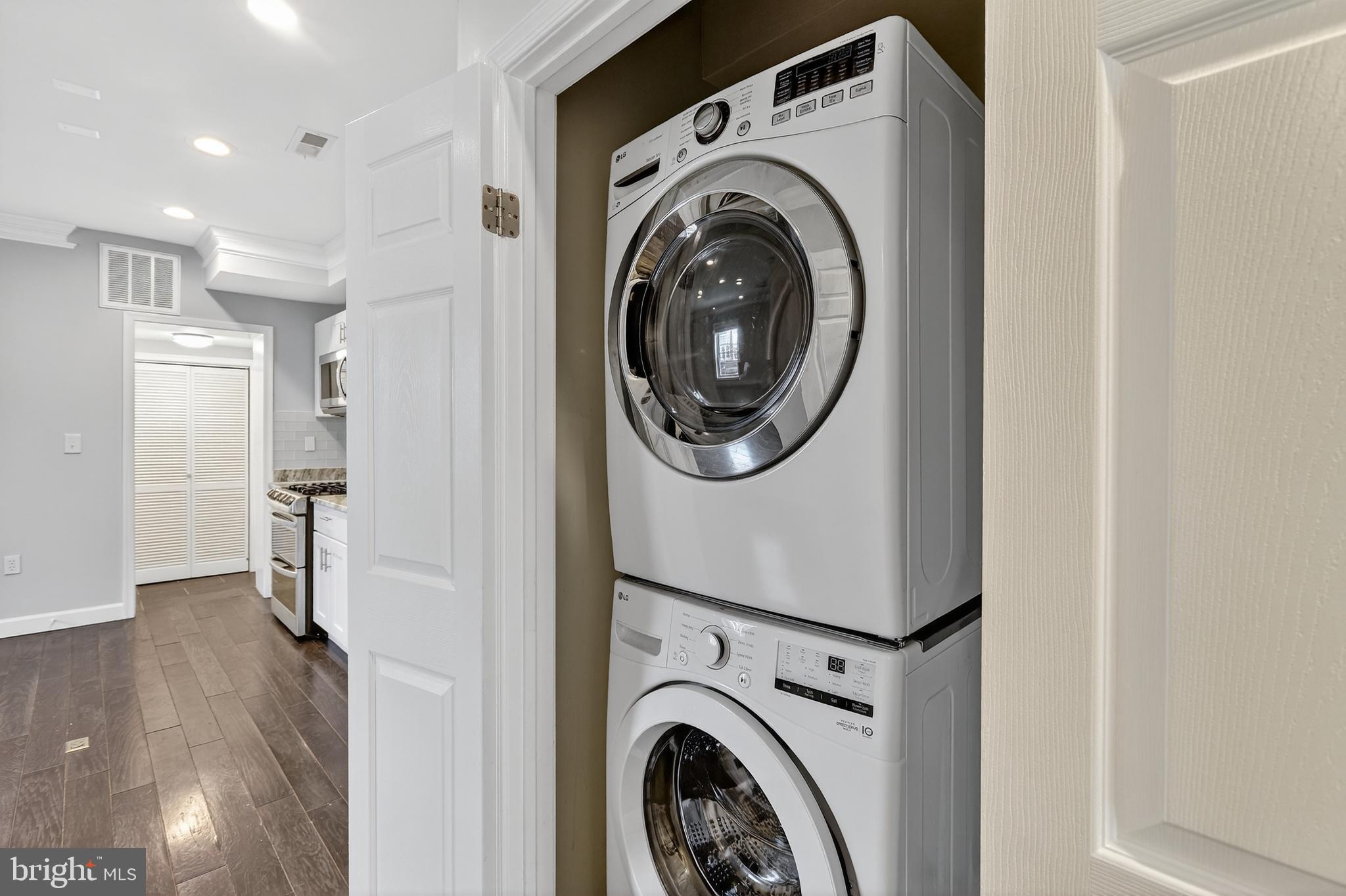 5619 1st Street Northwest, Unit 2 Washington, DC 20011 - Photo 10 of 27 a view of a hallway with washer and dryer