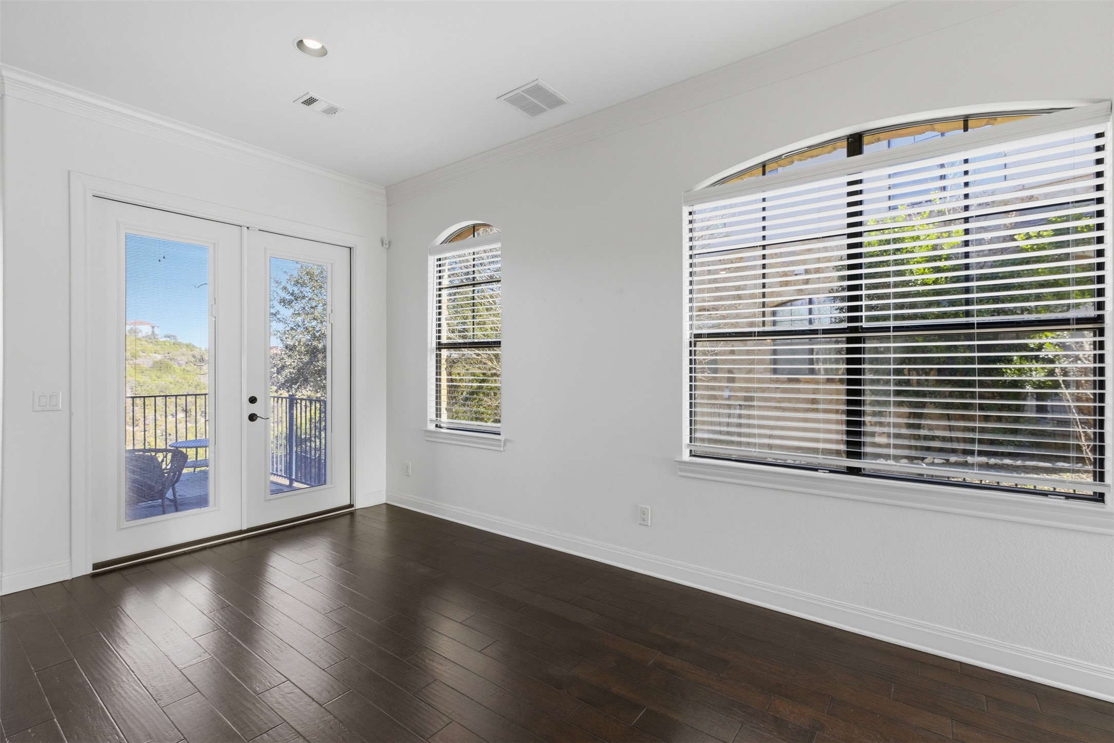 4000 Ranch Road 620 North, Unit 19 Austin, TX 78734 - Photo 15 of 39 a view of an empty room with wooden floor and a window