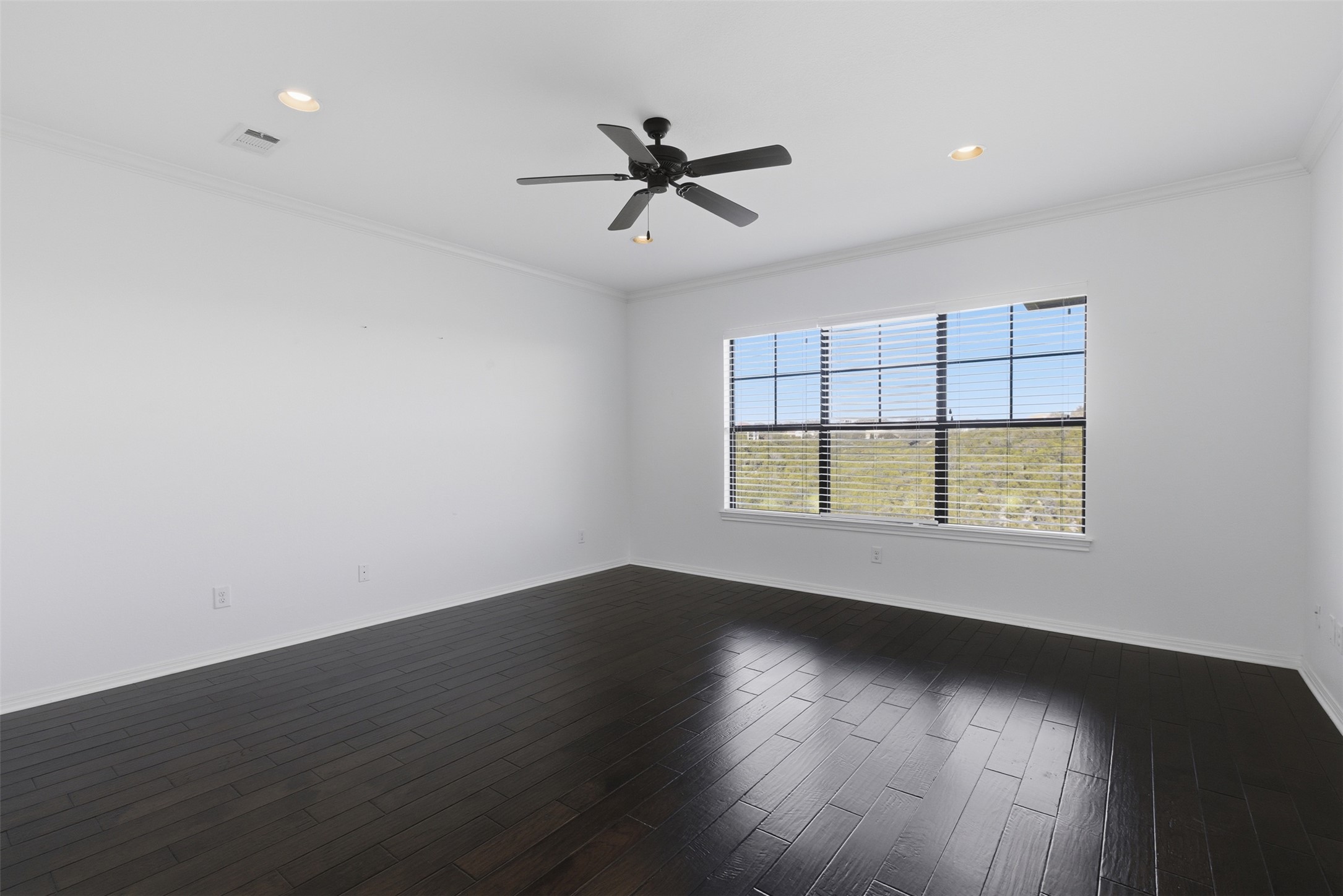 4000 Ranch Road 620 North, Unit 19 Austin, TX 78734 - Photo 21 of 39 an empty room with wooden floor and windows