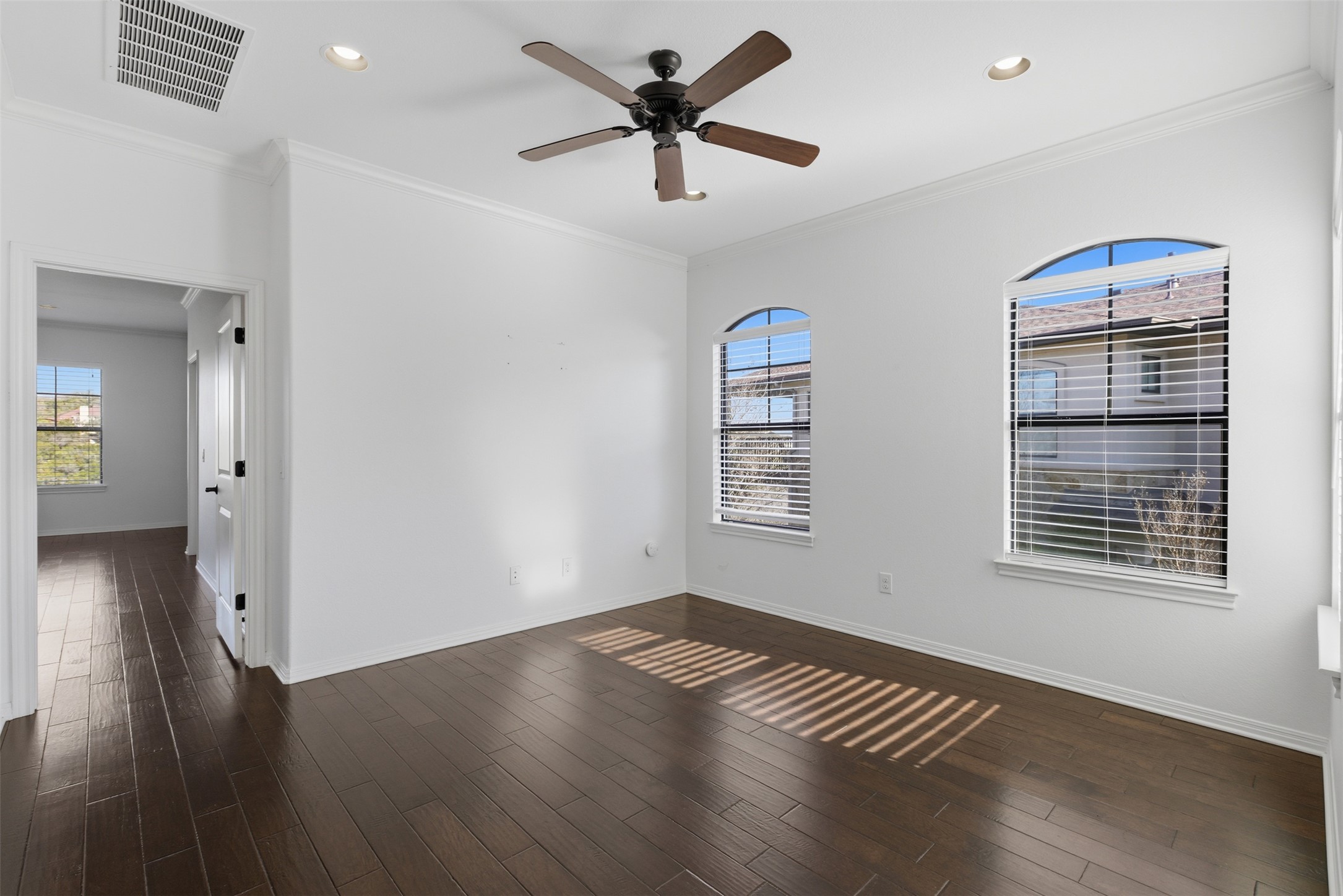 4000 Ranch Road 620 North, Unit 19 Austin, TX 78734 - Photo 27 of 39 a view of an empty room with window and wooden floor
