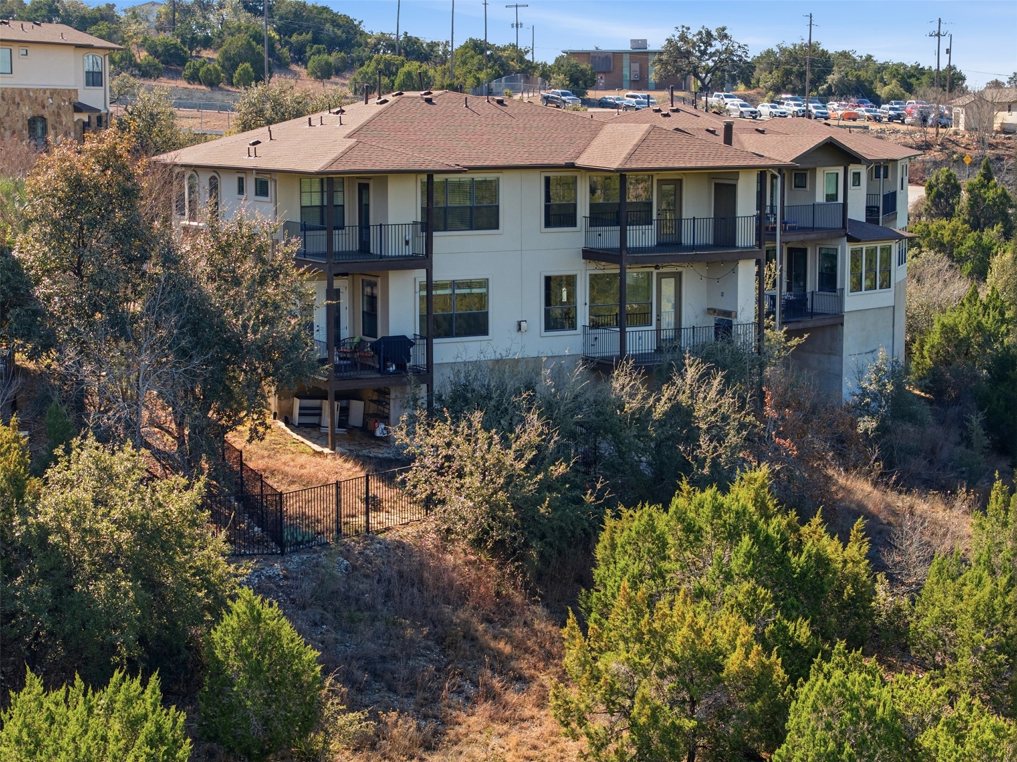 4000 Ranch Road 620 North, Unit 19 Austin, TX 78734 - Photo 34 of 39 a aerial view of a house with a yard and potted plants