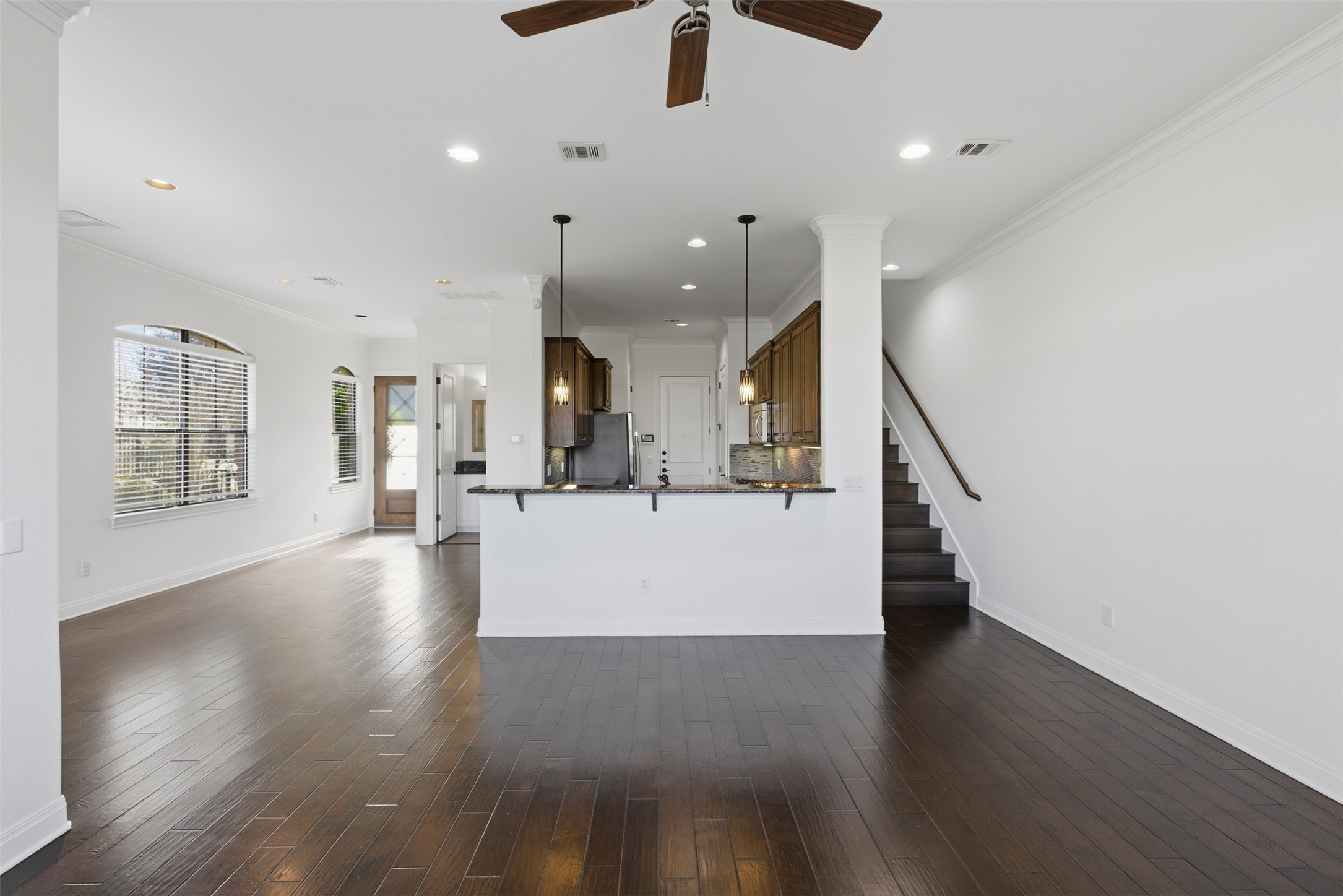 4000 Ranch Road 620 North, Unit 19 Austin, TX 78734 - Photo 9 of 39 a view of a kitchen and an entryway with wooden floor
