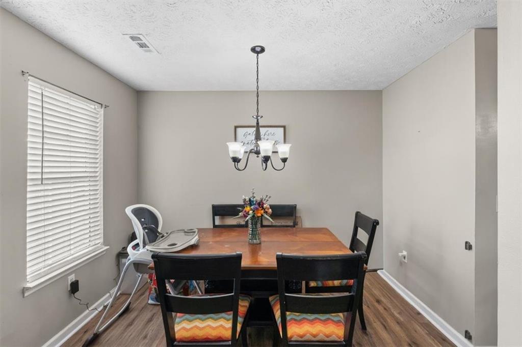 8 Stonegate Drive Cedartown, GA 30125 - Photo 13 of 42 a view of a dining room with a table and chairs