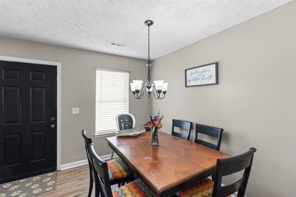 8 Stonegate Drive Cedartown, GA 30125 - Photo 14 of 42 a view of a dining room with furniture window and wooden floor