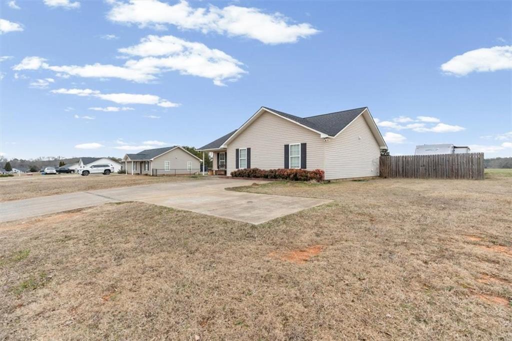 8 Stonegate Drive Cedartown, GA 30125 - Photo 2 of 42 a view of house with yard and ocean view