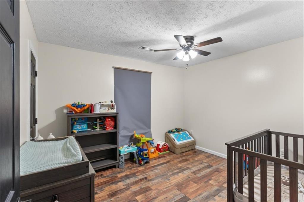8 Stonegate Drive Cedartown, GA 30125 - Photo 23 of 42 a view of a hallway to a livingroom with furniture