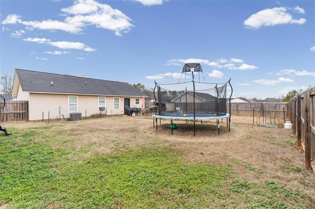 8 Stonegate Drive Cedartown, GA 30125 - Photo 30 of 42 a view of a house with backyard porch and entertaining space