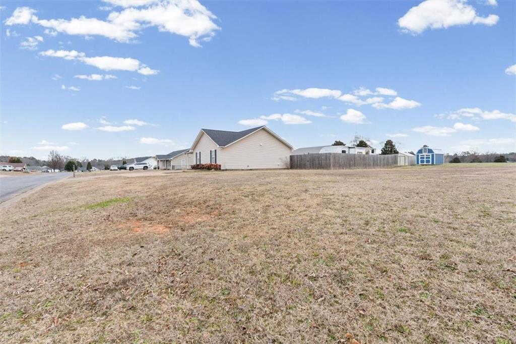 8 Stonegate Drive Cedartown, GA 30125 - Photo 32 of 42 a view of a lake and a yard