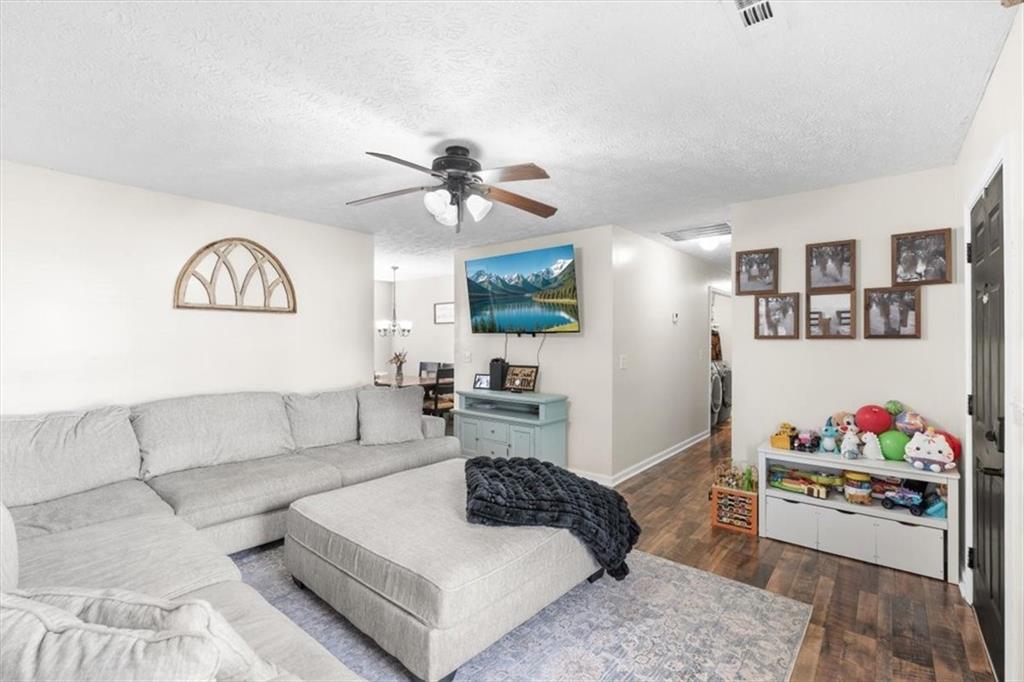 8 Stonegate Drive Cedartown, GA 30125 - Photo 6 of 42 a living room with furniture kitchen and a couch