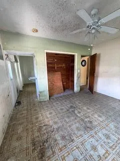 a kitchen with a sink and toilet