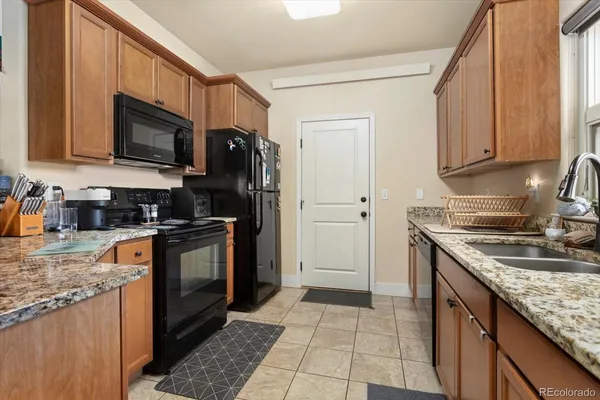 a view of a hallway with washer and dryer