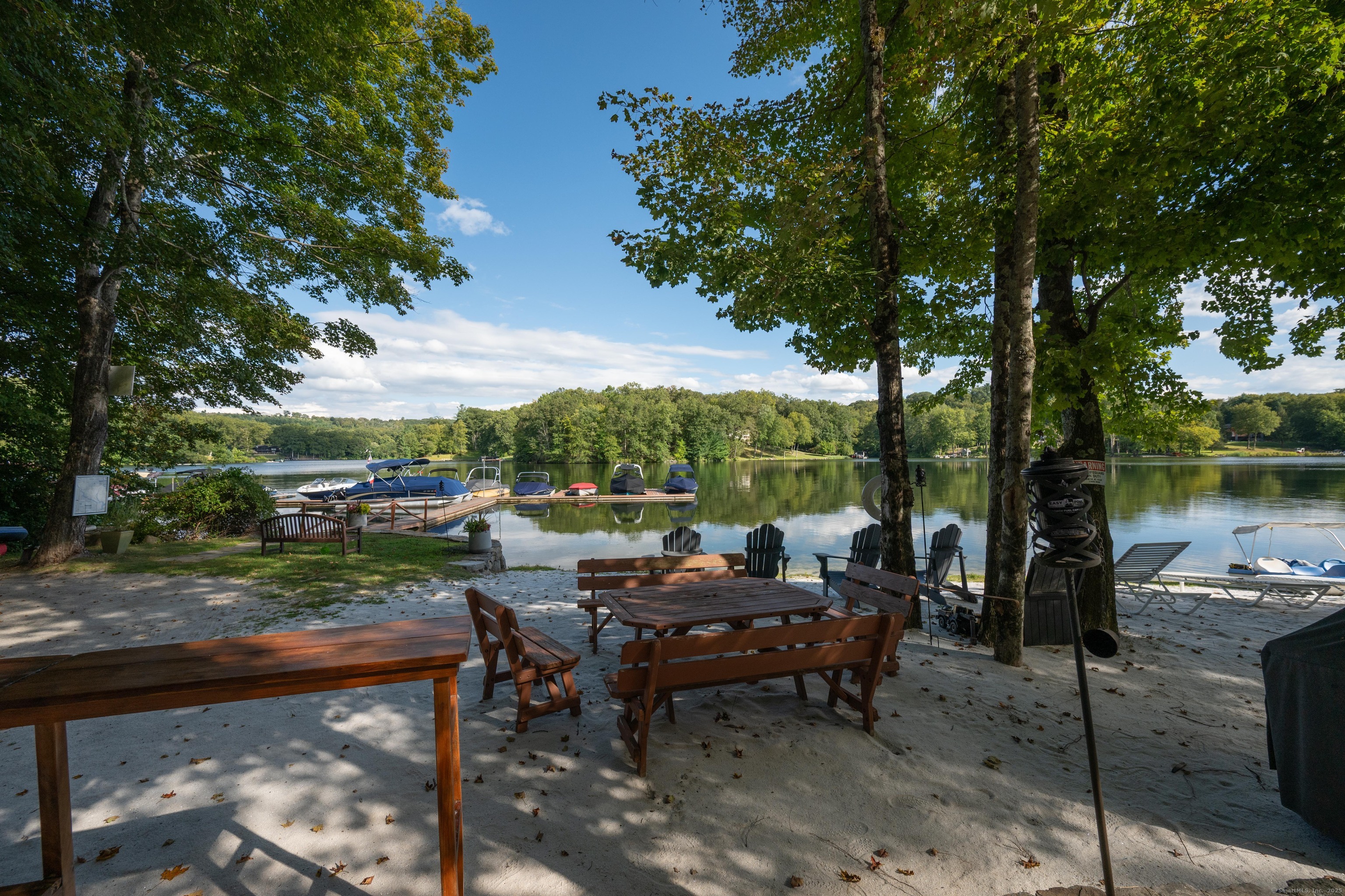 26 Cove Road Brookfield, CT 06804 - Photo 1 of 40 a view of a patio with chairs and a table