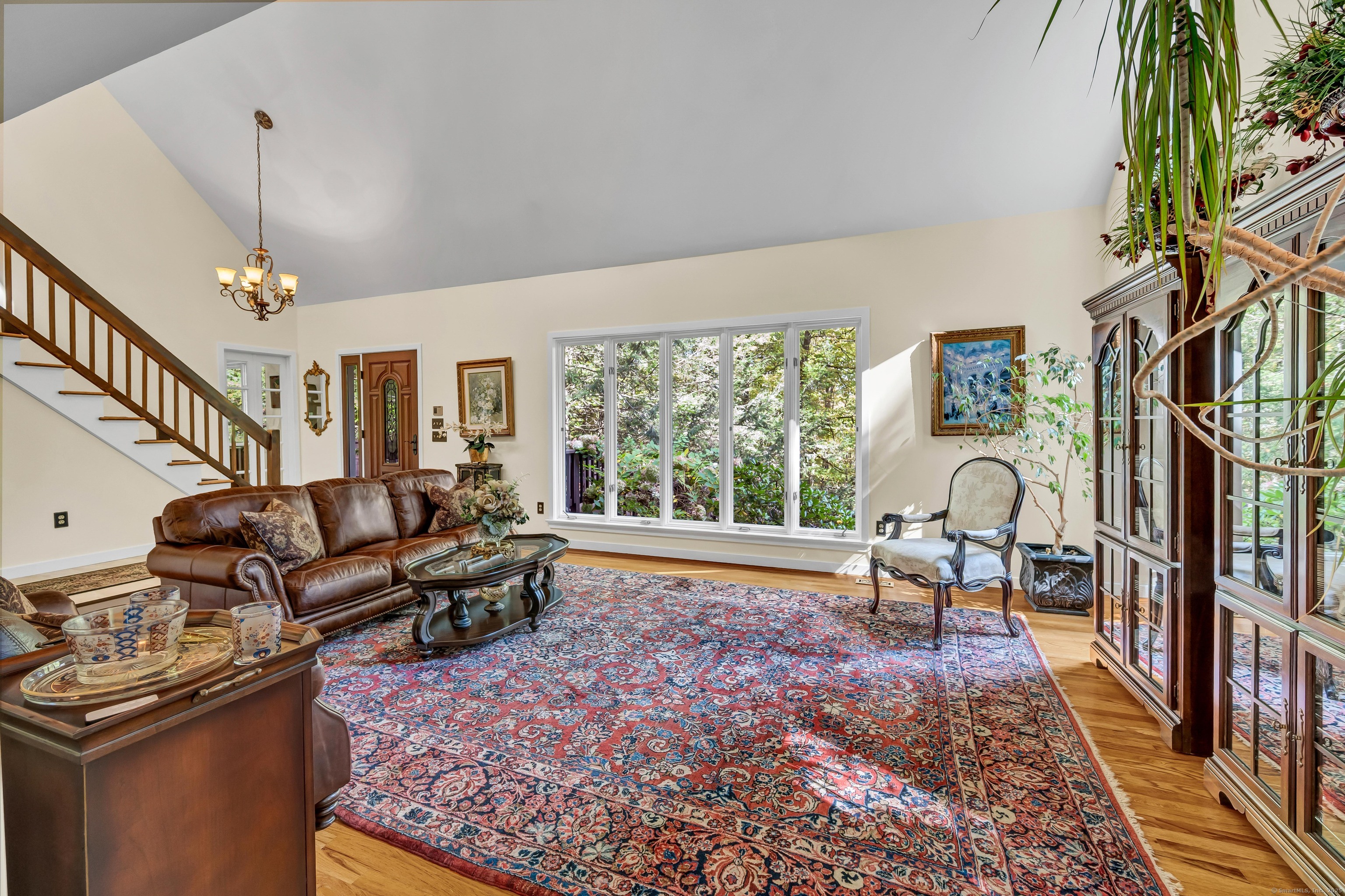 26 Cove Road Brookfield, CT 06804 - Photo 14 of 40 a living room with furniture fireplace and a rug
