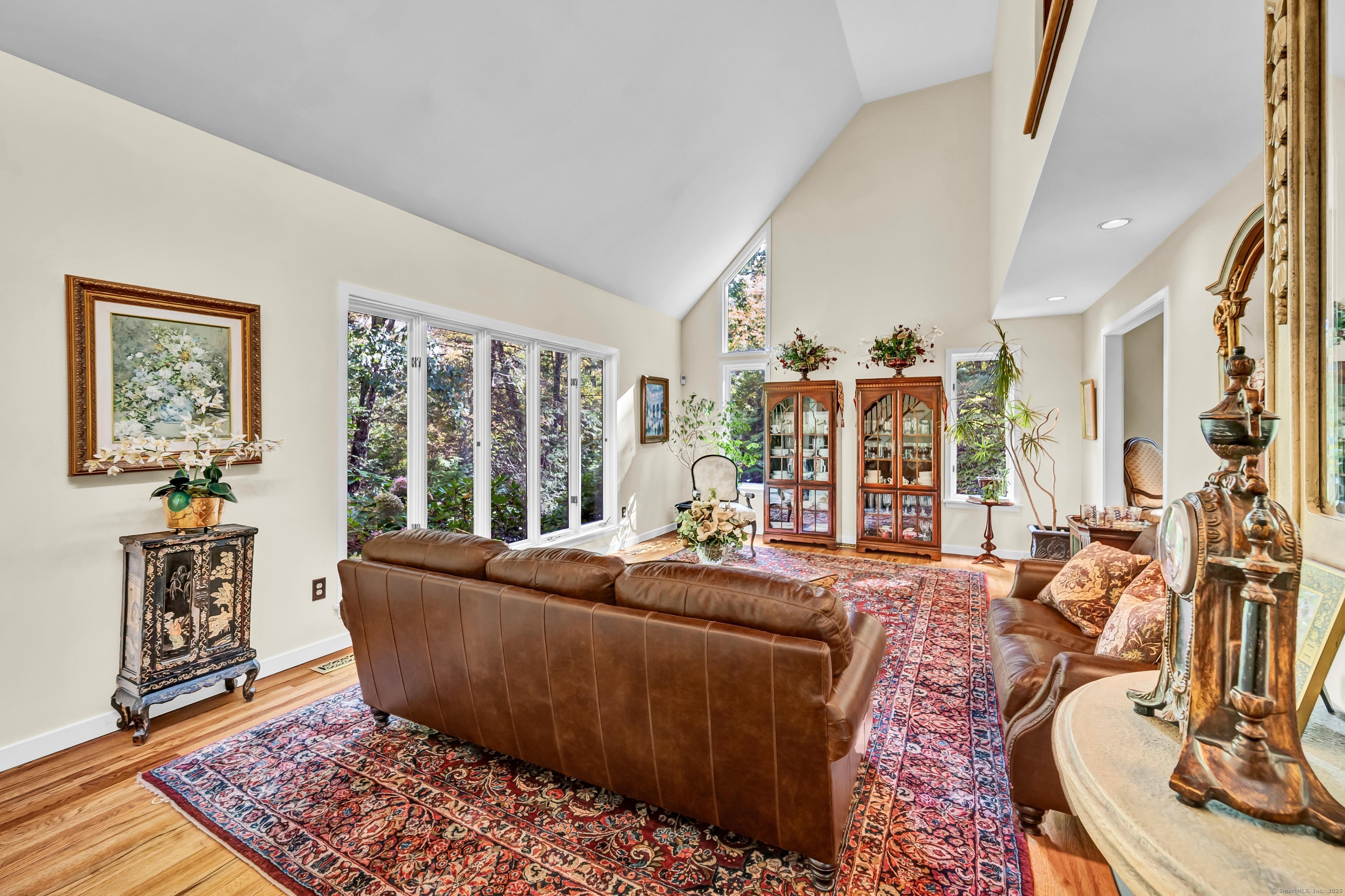 26 Cove Road Brookfield, CT 06804 - Photo 16 of 40 a living room with furniture large window and a table