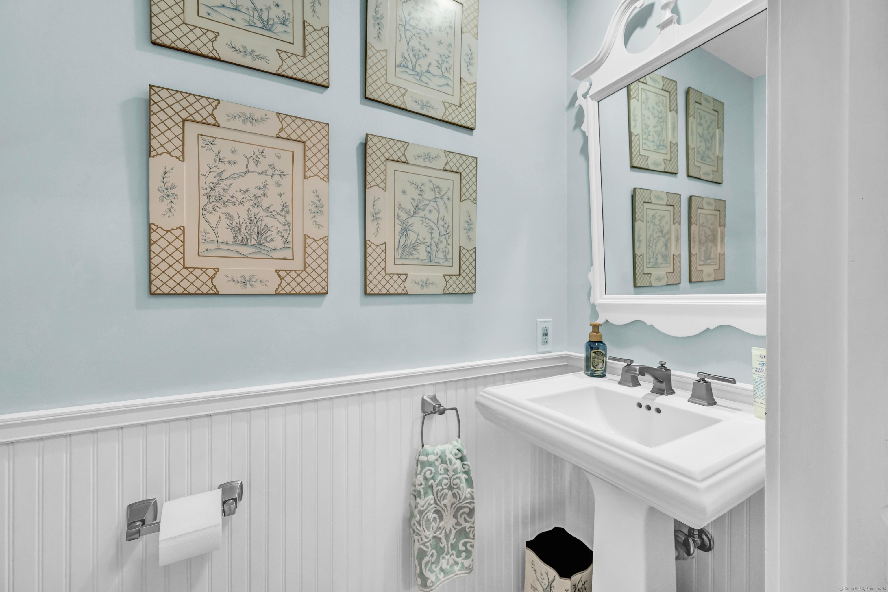 26 Cove Road Brookfield, CT 06804 - Photo 17 of 40 a bathroom with a sink and a mirror