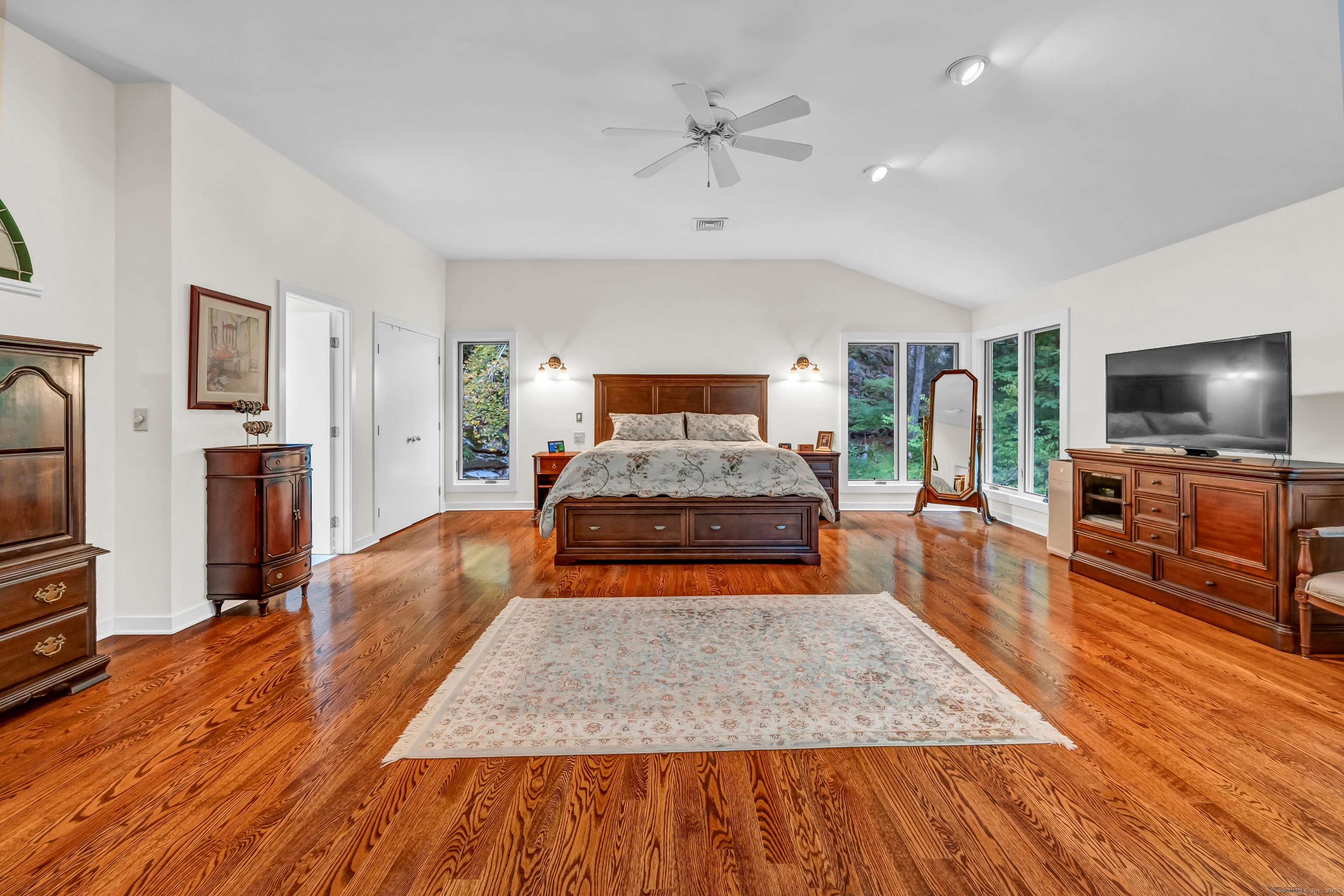 26 Cove Road Brookfield, CT 06804 - Photo 19 of 40 a living room with furniture and a flat screen tv