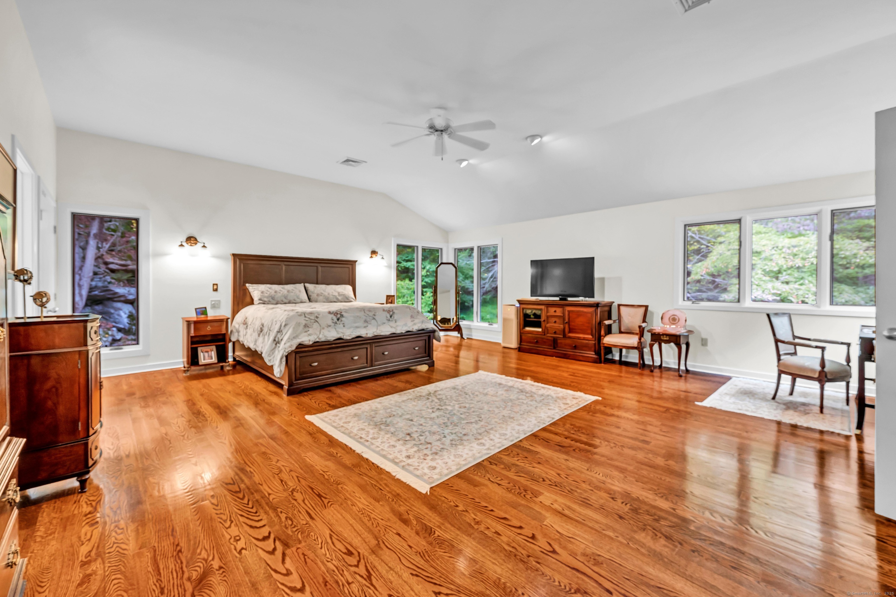 26 Cove Road Brookfield, CT 06804 - Photo 20 of 40 a bedroom with furniture and large windows