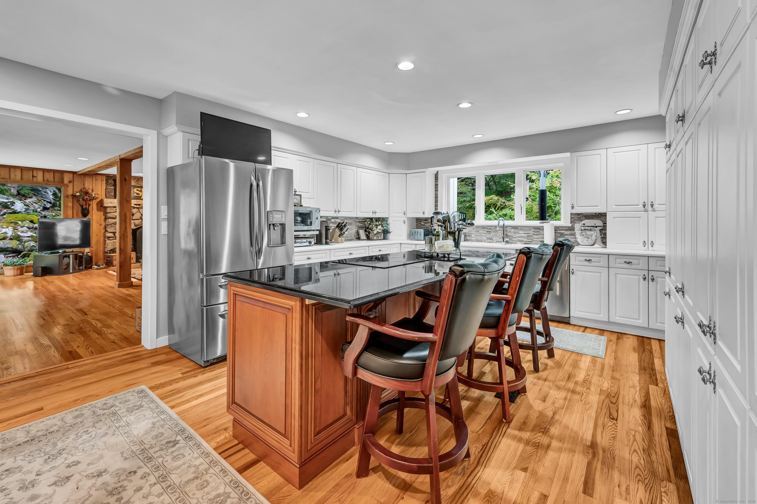 26 Cove Road Brookfield, CT 06804 - Photo 2 of 40 a view of a dining room with furniture window and outside view