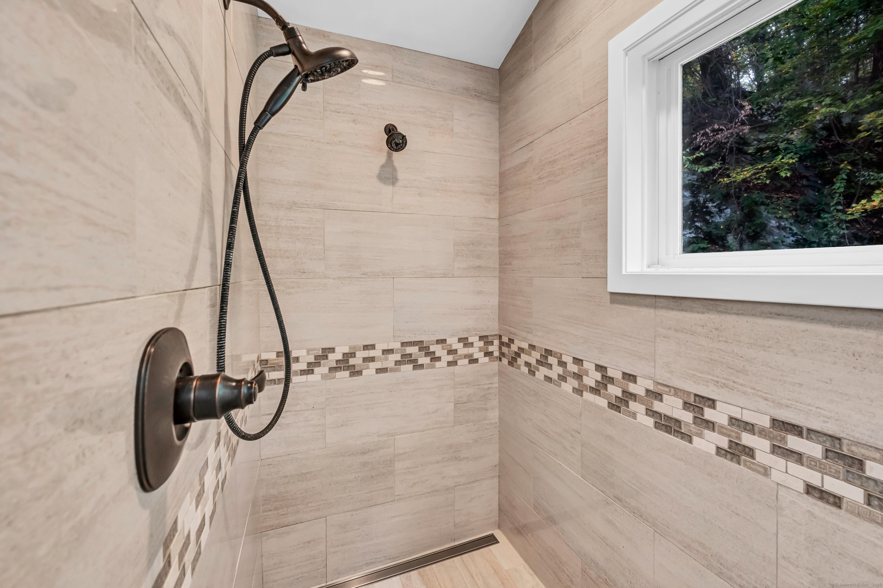 26 Cove Road Brookfield, CT 06804 - Photo 27 of 40 a bathroom with a shower