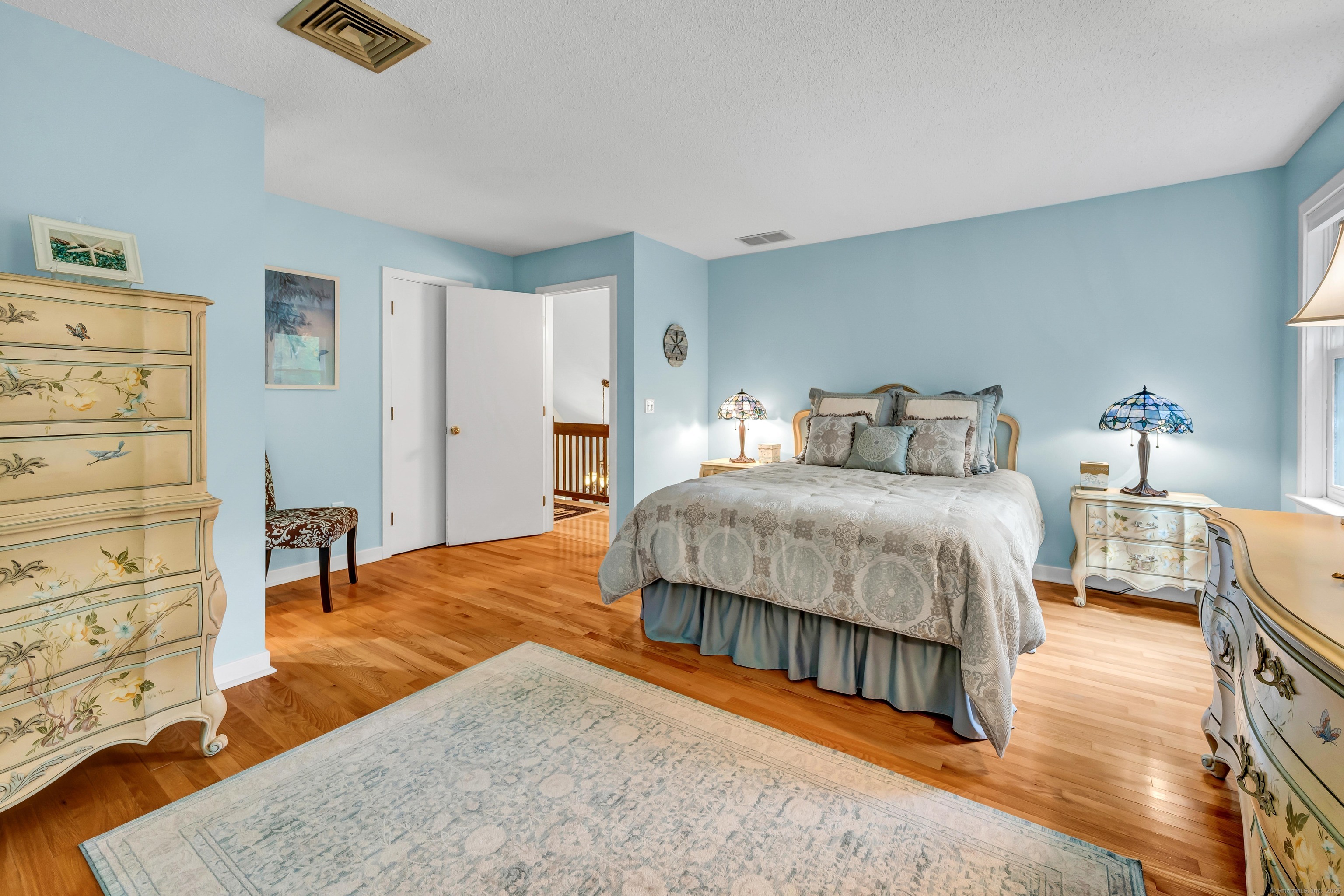 26 Cove Road Brookfield, CT 06804 - Photo 28 of 40 a bedroom with a bed and dresser