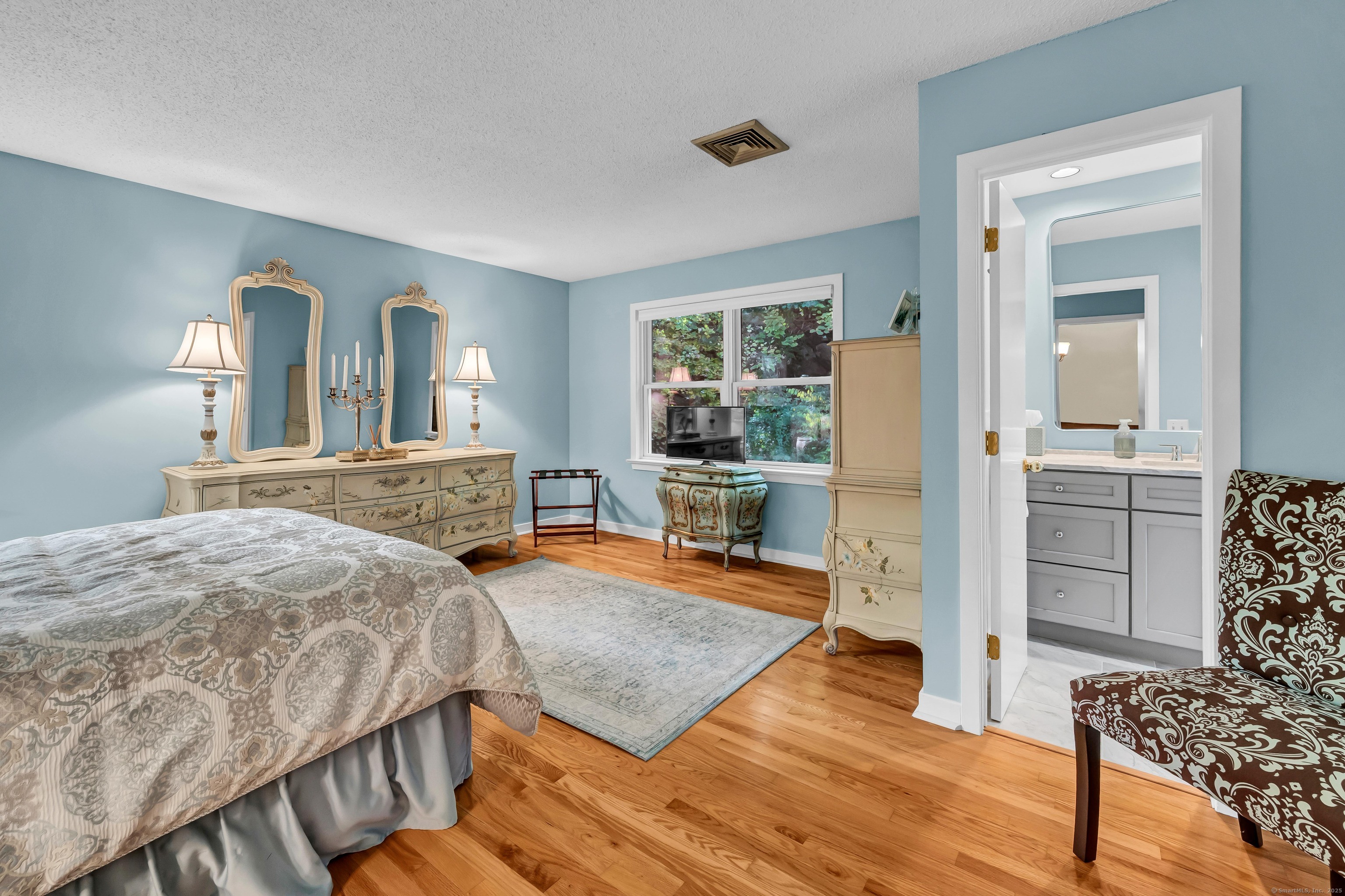 26 Cove Road Brookfield, CT 06804 - Photo 29 of 40 a living room with furniture and a fireplace