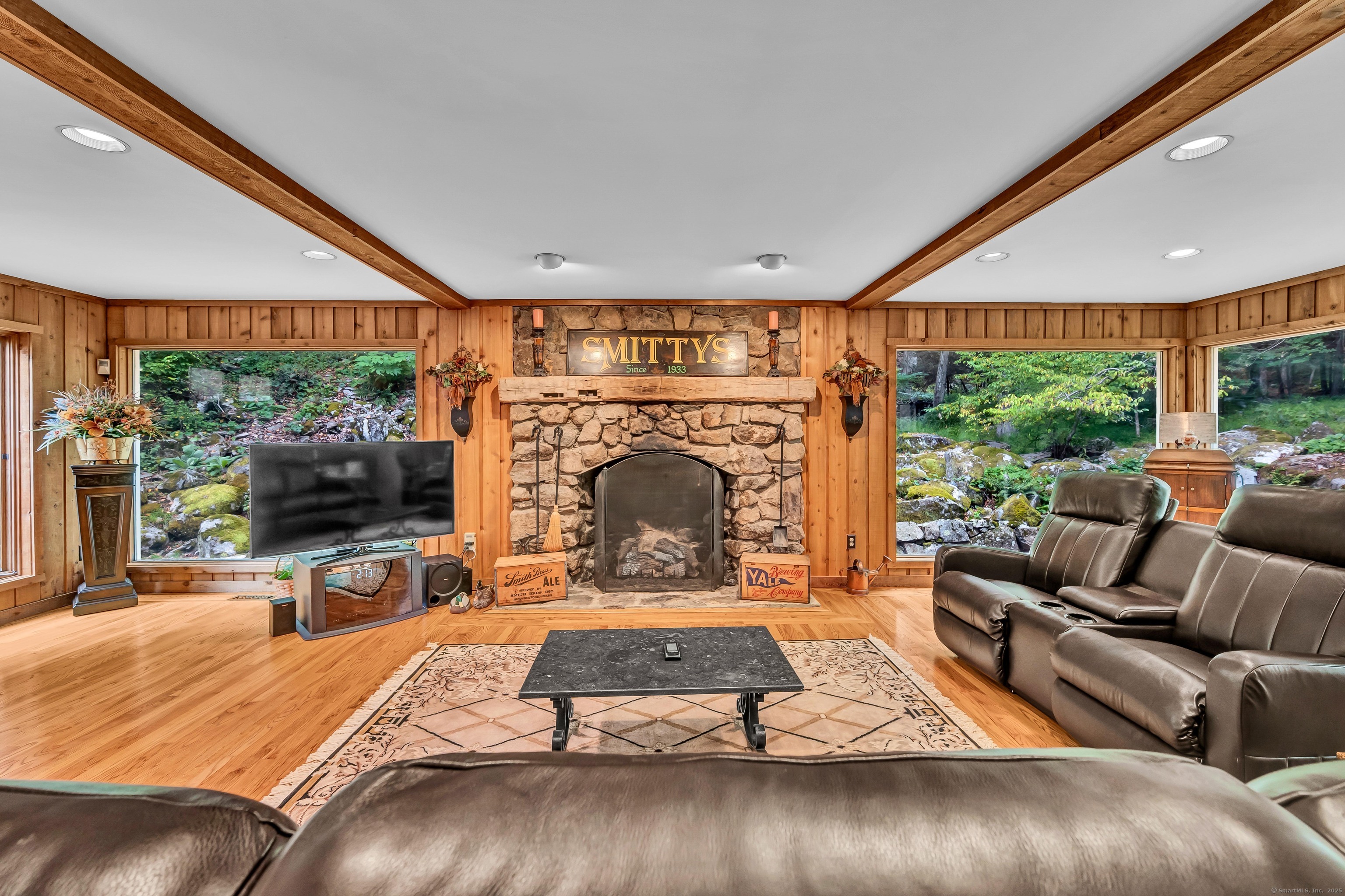 26 Cove Road Brookfield, CT 06804 - Photo 6 of 40 a living room with furniture and a fireplace