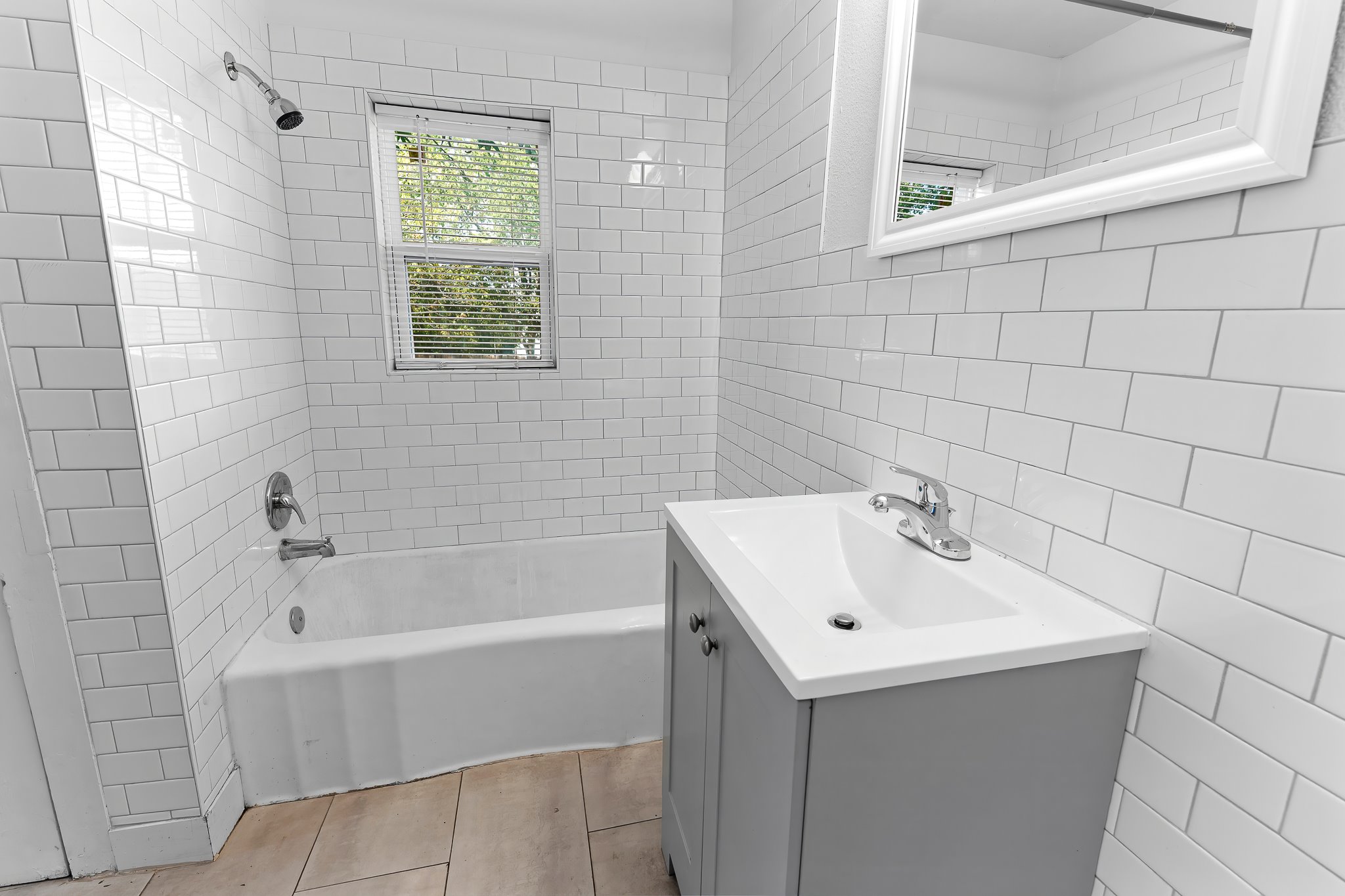 204 Lessin Lane Austin, TX 78704 - Photo 29 of 35 a white bath tub sitting next to a white sink