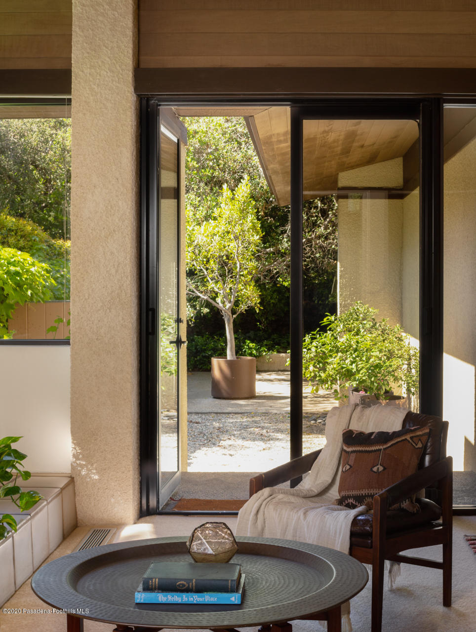 999 Buckingham Place Pasadena, CA 91105 - Photo 24 of 36 a living room with furniture and a potted plant