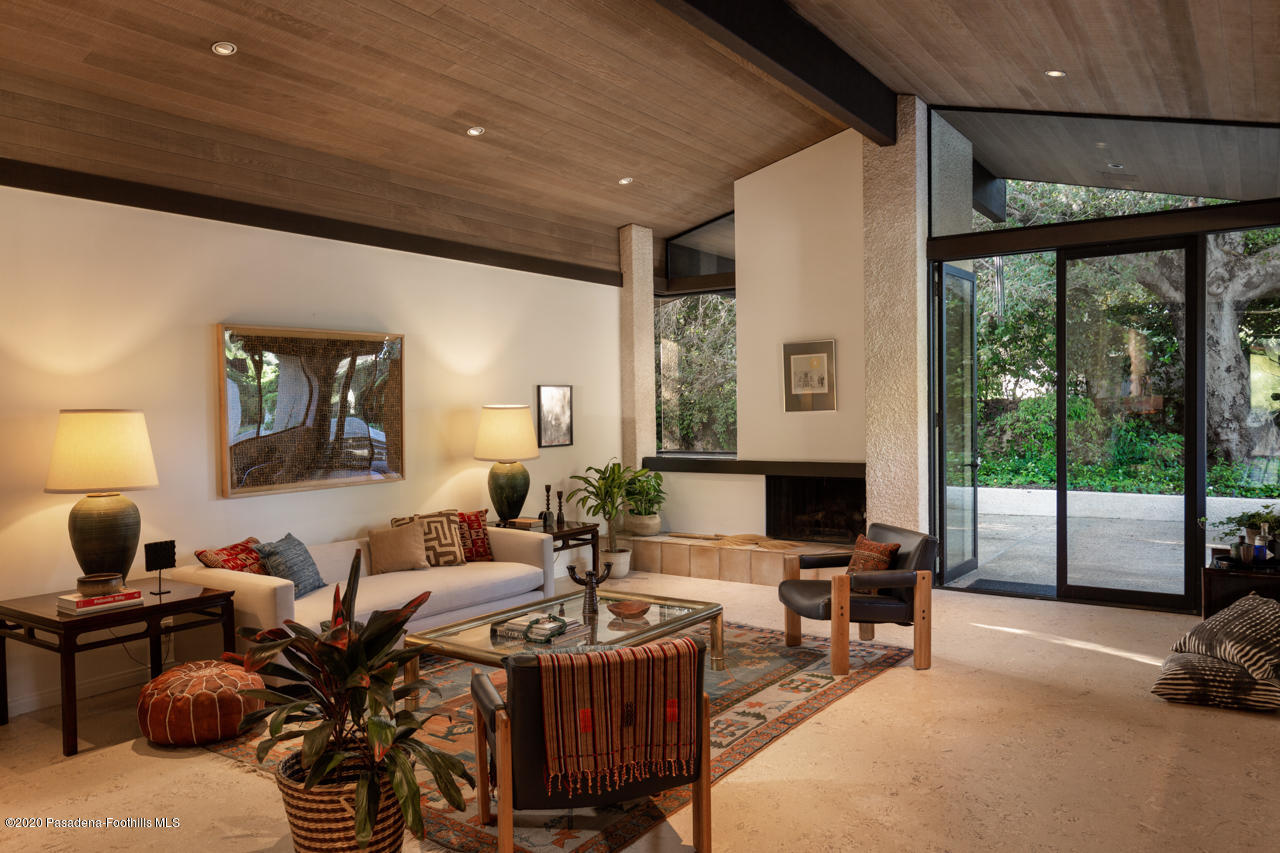 999 Buckingham Place Pasadena, CA 91105 - Photo 6 of 36 a living room with lots of furniture and a large window