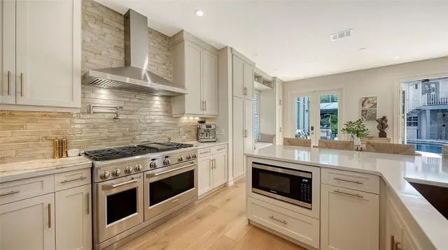 a view of a balcony with chairs