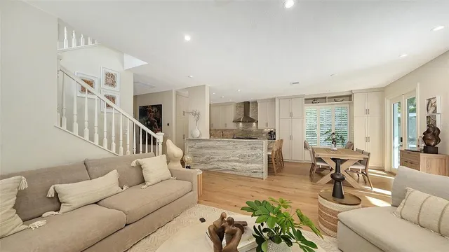 a kitchen with stainless steel appliances granite countertop a stove and a sink