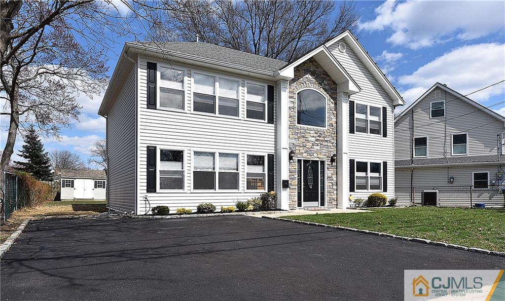 3 Caldwell Road Edison, NJ 08817 - Photo 1 of 25 front view of a house with a street
