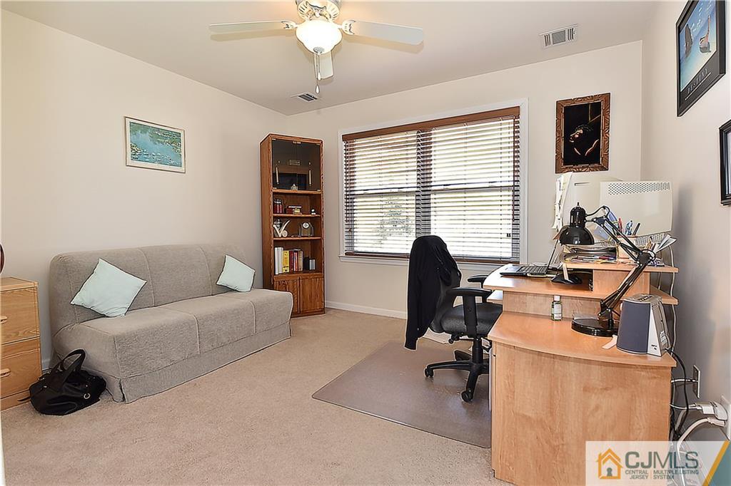 3 Caldwell Road Edison, NJ 08817 - Photo 20 of 25 a view of a livingroom with workspace and a couch