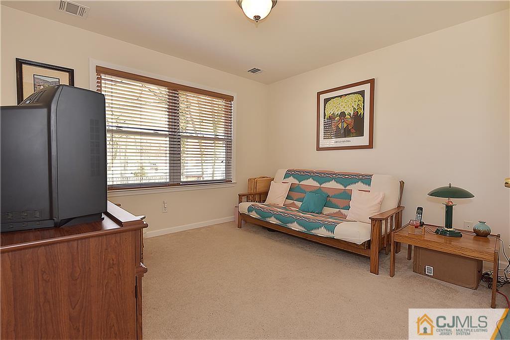 3 Caldwell Road Edison, NJ 08817 - Photo 21 of 25 a living room with furniture and a window