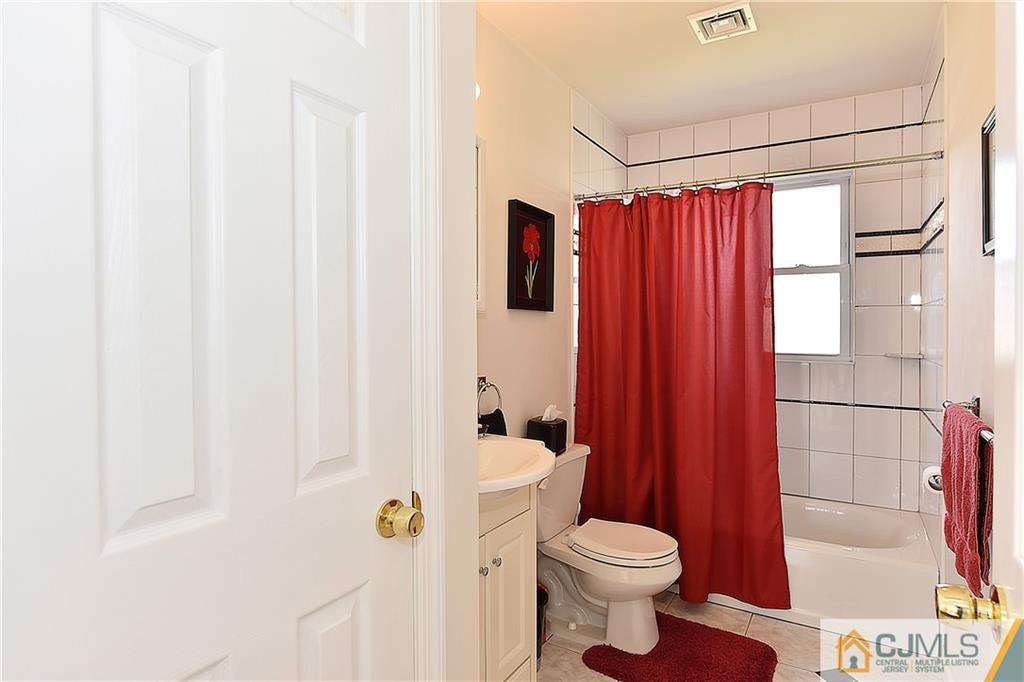 3 Caldwell Road Edison, NJ 08817 - Photo 23 of 25 a bathroom with a toilet and shower