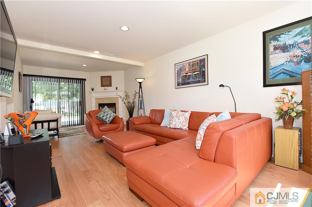 3 Caldwell Road Edison, NJ 08817 - Photo 5 of 25 a living room with furniture and a flat screen tv