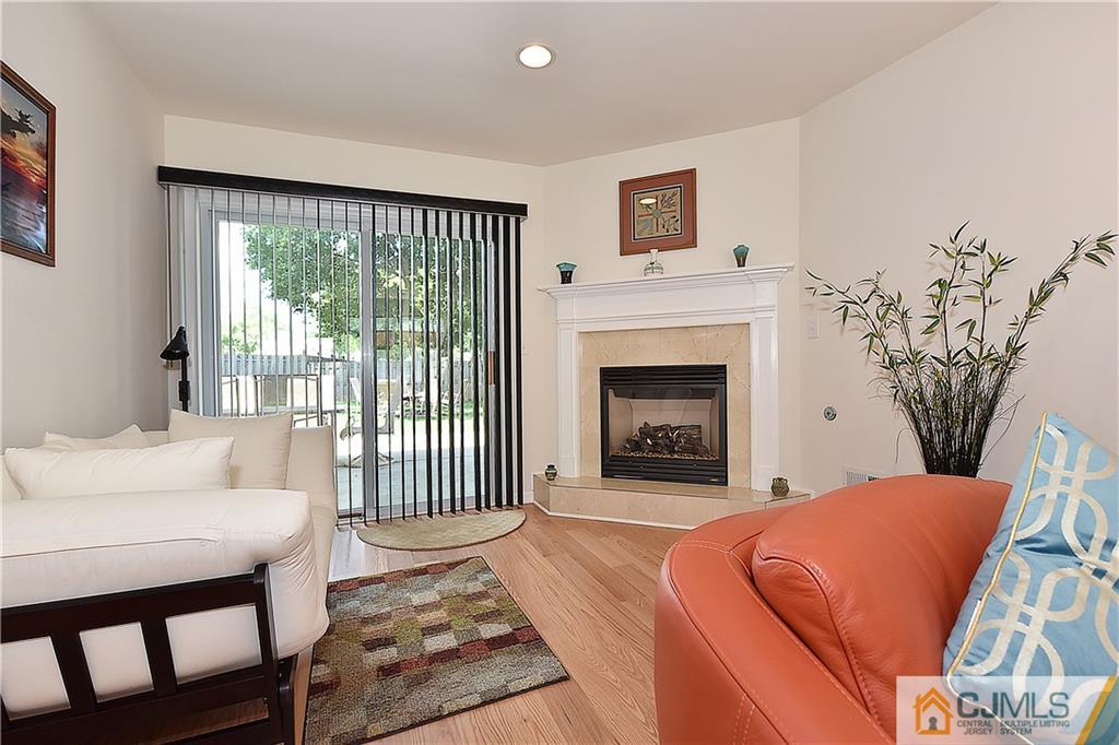 3 Caldwell Road Edison, NJ 08817 - Photo 7 of 25 a bedroom with a bed and a fireplace