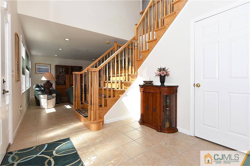 3 Caldwell Road Edison, NJ 08817 - Photo 8 of 25 a view of entryway and hall with wooden floor