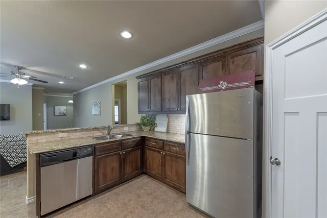 a view of workspace with window and cabinet
