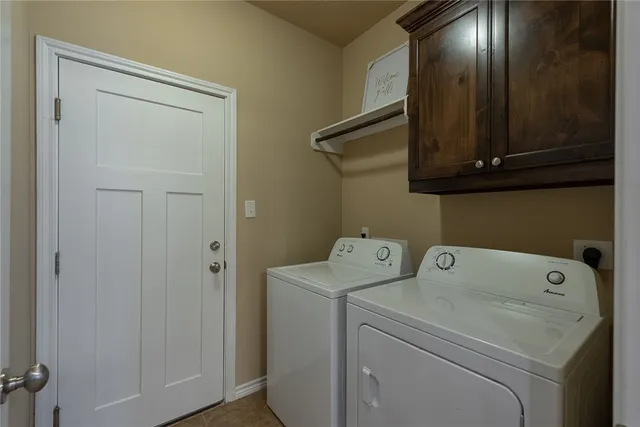 a living room with furniture and white walls