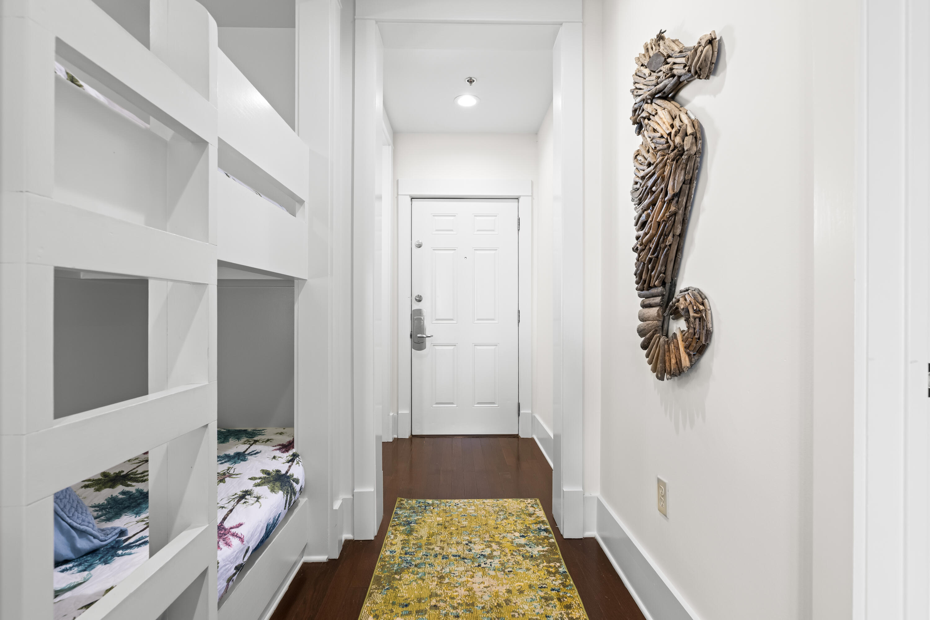 2046 West County Highway 30A, Unit M2428 Santa Rosa Beach, FL 32459 - Photo 11 of 72 a bedroom with a bed and a rug