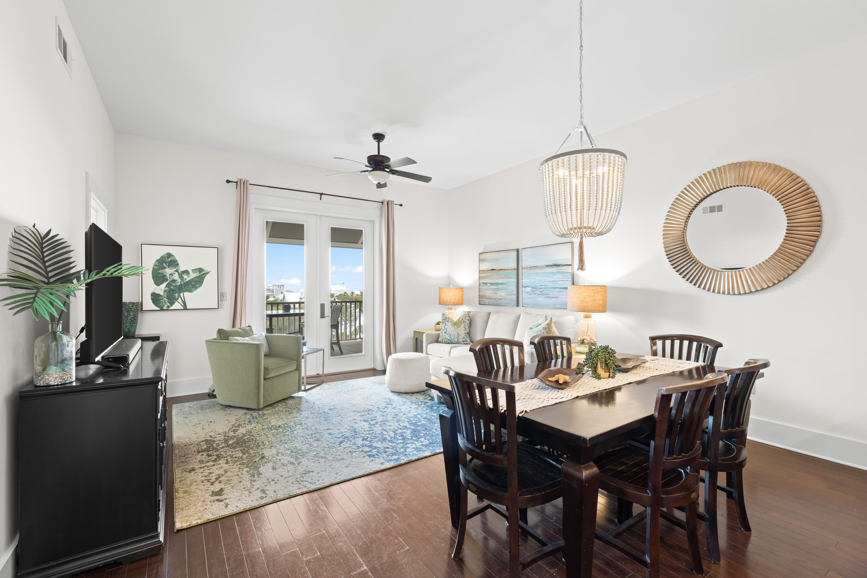 2046 West County Highway 30A, Unit M2428 Santa Rosa Beach, FL 32459 - Photo 19 of 72 a view of a dining room with furniture window and wooden floor
