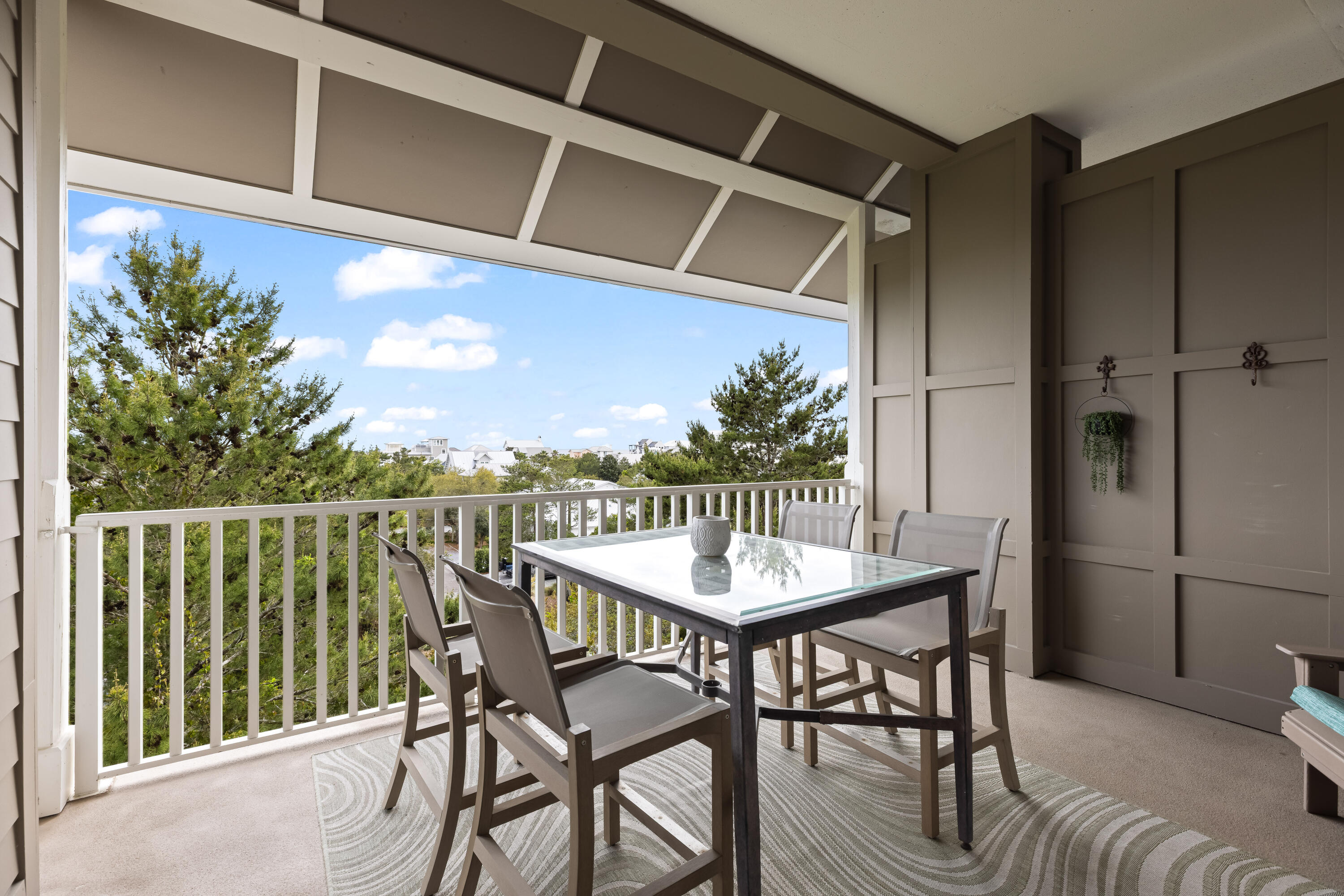 2046 West County Highway 30A, Unit M2428 Santa Rosa Beach, FL 32459 - Photo 38 of 72 a view of balcony with furniture and wooden deck