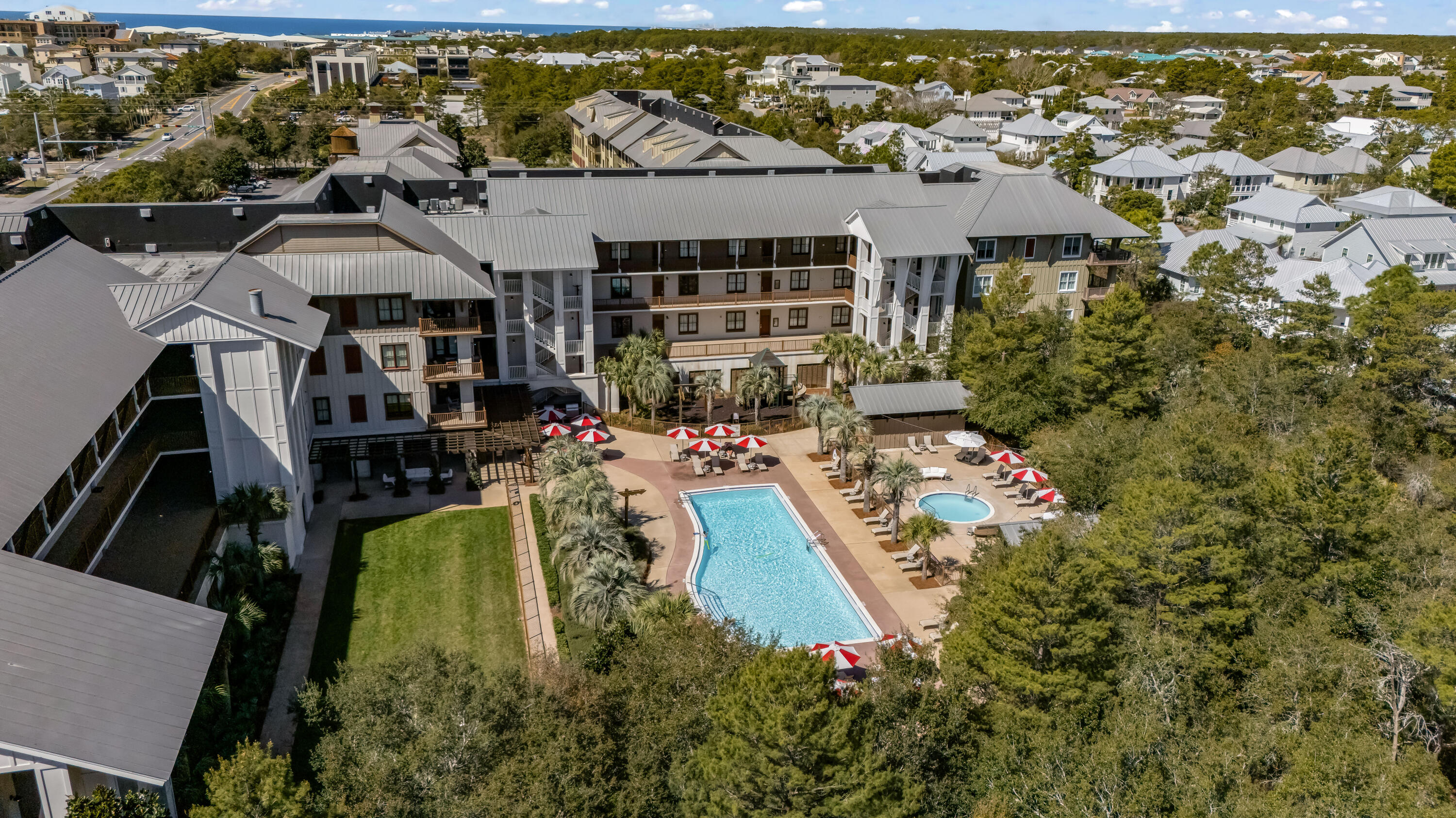 2046 West County Highway 30A, Unit M2428 Santa Rosa Beach, FL 32459 - Photo 50 of 72 an aerial view of a house with swimming pool and lake view