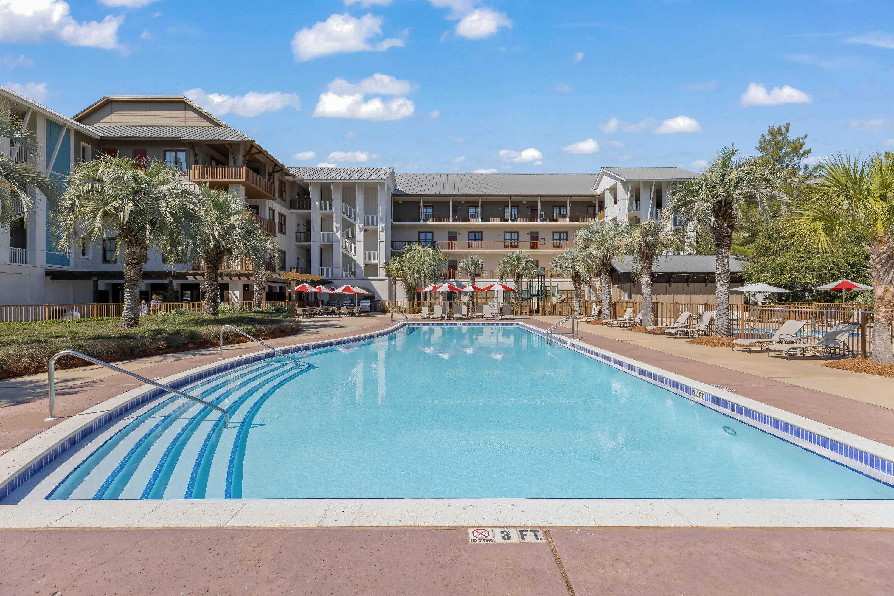 2046 West County Highway 30A, Unit M2428 Santa Rosa Beach, FL 32459 - Photo 55 of 72 a view of a swimming pool with outdoor seating
