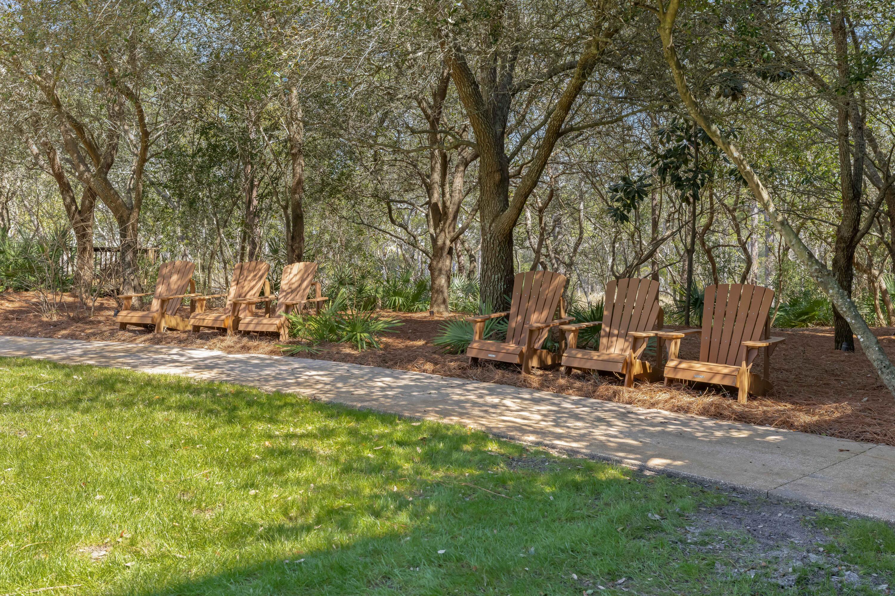 2046 West County Highway 30A, Unit M2428 Santa Rosa Beach, FL 32459 - Photo 70 of 72 a view of a park with large trees