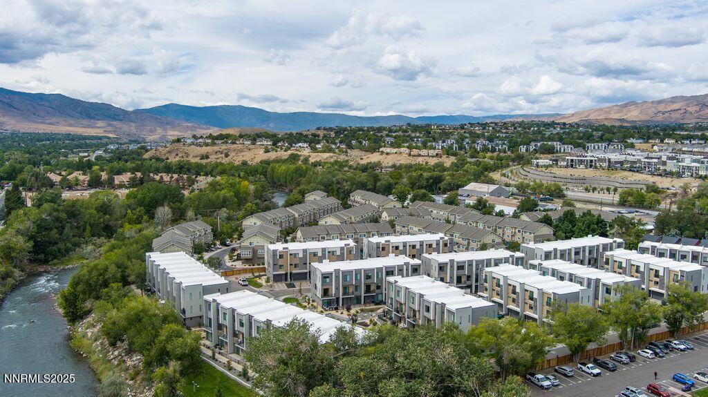 a view of a city with a lake