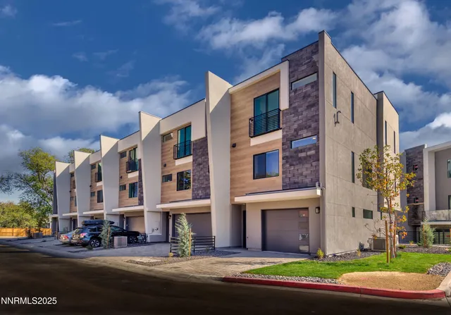 a front view of a building with street view