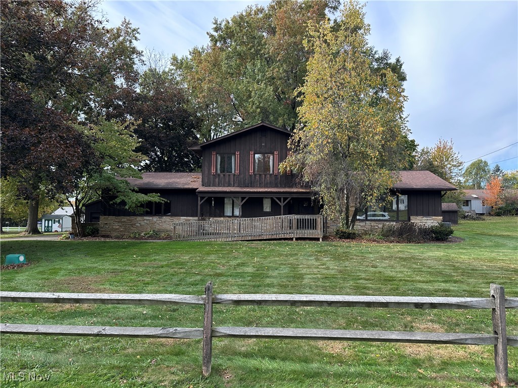 978 Southwold Road Akron, OH 44321 - Photo 1 of 43 View of front facade with covered porch and board and batten siding